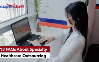 A SuperStaff executive performs specialty healthcare outsourcing tasks with her laptop.