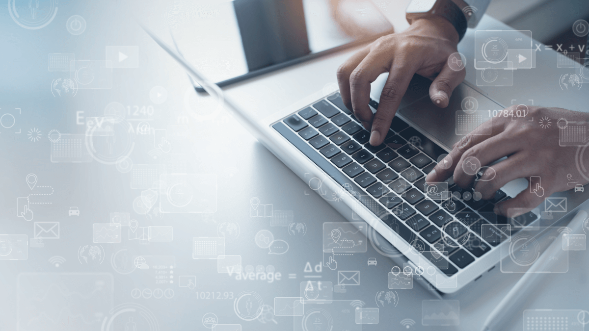 A man using his laptop for data science outsourcing tasks.