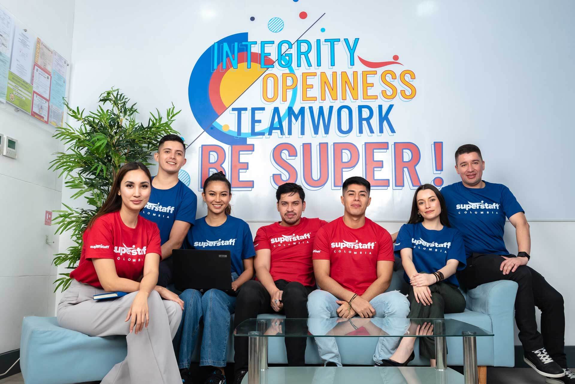 Group Picture of SuperStaff's Employees Sitting and Smiling