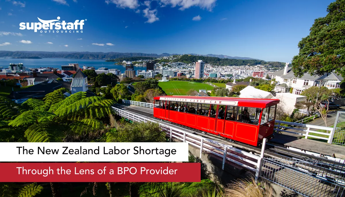 An image shows New Zealand city center. Caption says New Zealand labor shortage in the lens of a BPO provider.