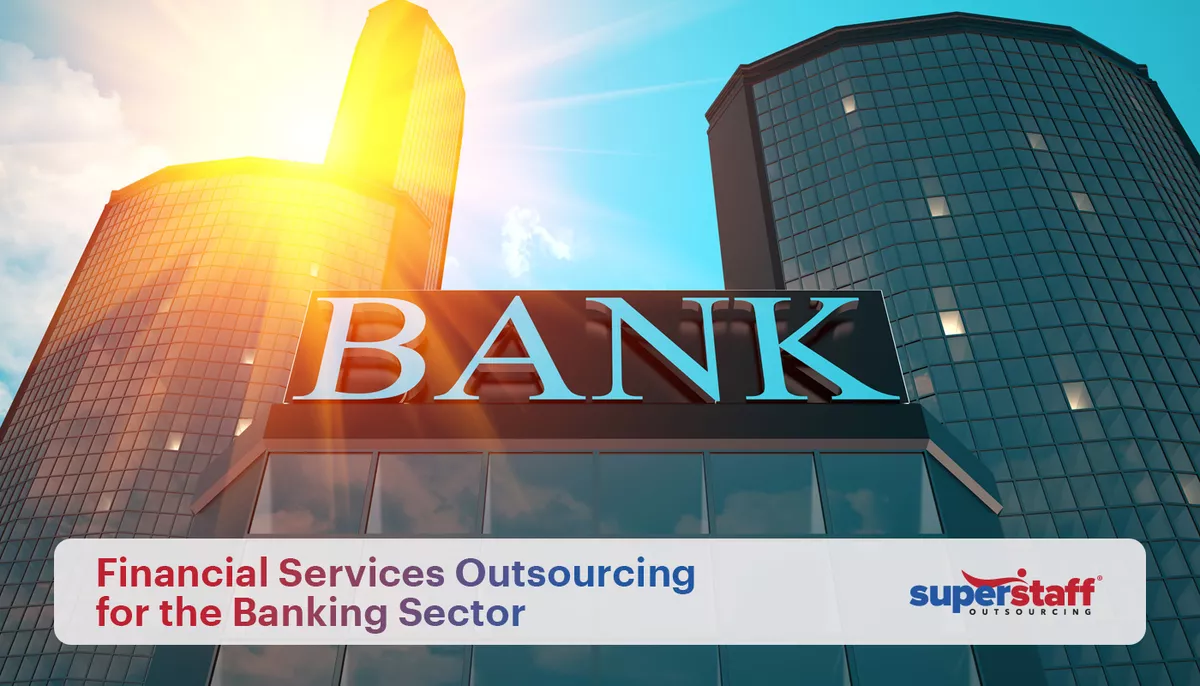 An image shows a bank building. The text reads Why Banking Sector Should Outsource Financial Services.