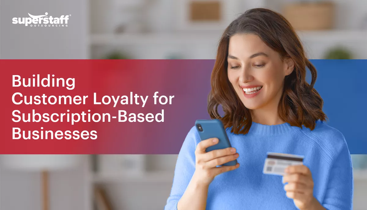 The photo shows a happy client holding a credit card in one hand and a phone in the other. The image also shows the title of the blog, "Building Customer Loyalty in 2024: The Crucial Role of Customer Service in Subscription-Based Products."