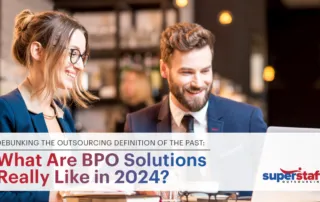 Two professionals are smiling. Image caption says: What are BPO Solutions Really Like in 2024?