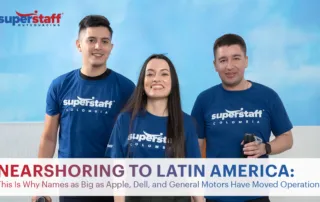 Three SuperStaff specialists from Colombia are smiling. Image caption reads: NEARSHORING TO LATIN AMERICA: This Is Why Names as Big as Apple, Dell, and General Motors Have Moved Operations