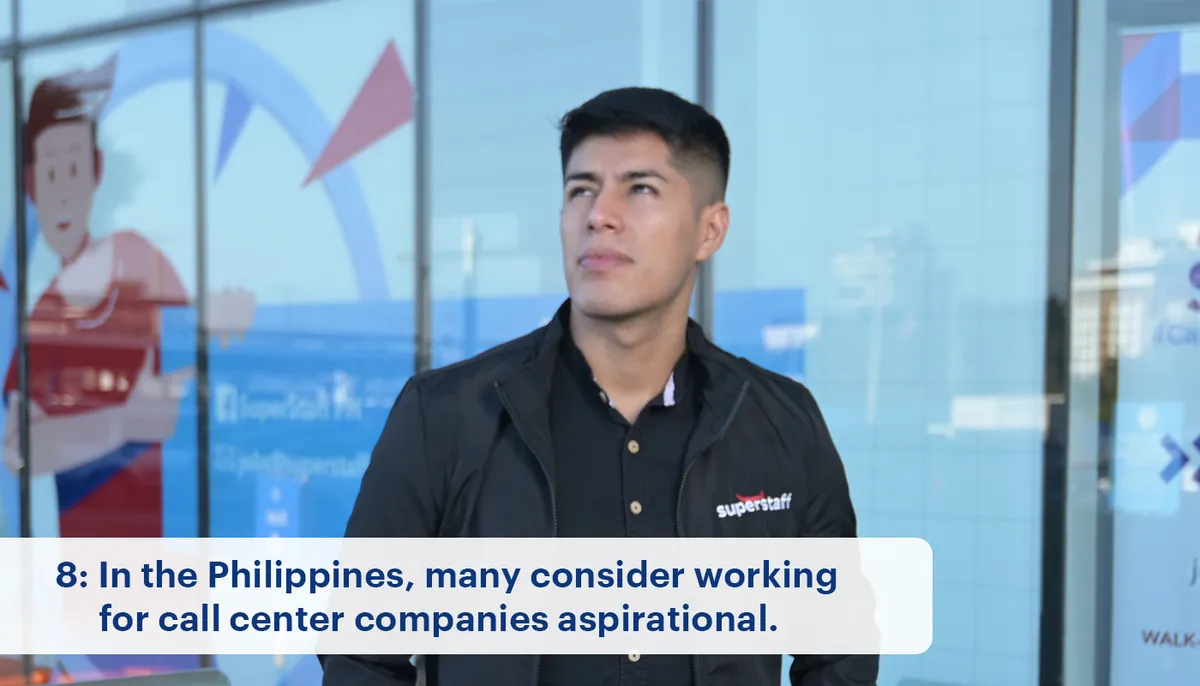 A man looks up, thinking about working for a call center in the Philippines.