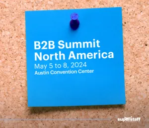 A post-it shows the schedule for B2B Summit North America.