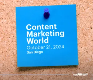 A post-it shows schedule for Content Marketing World, a B2B sales conference.