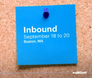 A post-it shows schedule for Inbound, a B2B sales conference.