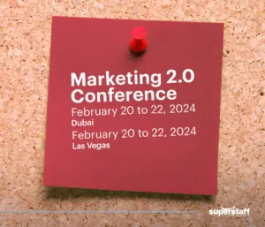 A post-it shows schedule of Marketing 2.0 Conference, a B2B sales conference. 
