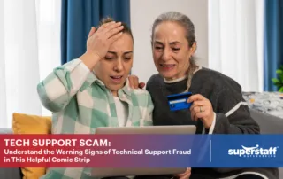 Two women were shocked as they look at their bank card, suggesting that they have been victims of tech support fraud.