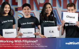 Four call center agents hold signs. Each sign reads Dasurv, For a While, C.R., Charot which are common slang used by Filipinos.