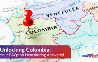 A red pin on Colombian map. Image caption reads: Unlocking Colombia: Your FAQs on Nearshoring Answered