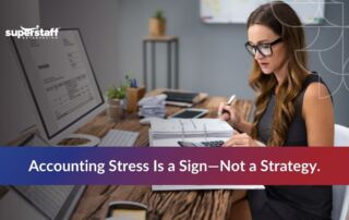 woman reviews invoices at her desk, highlighting the importance of managing accounting stress effectively.