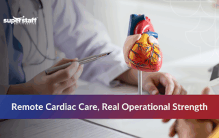 Examining a scientific heart model with text 'Remote Cardiac Care’