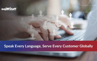 Hand typing with floating icons, representing multilingual call center services.