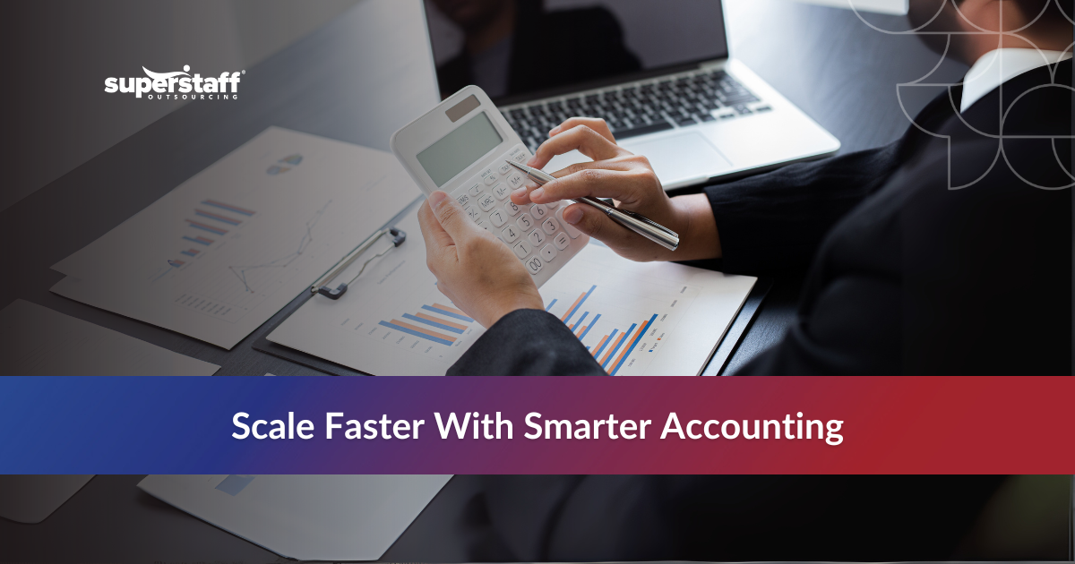 Startup professional using calculator to manage finances with an outsourced accounting firm for startups.
