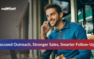 Smiling male agent taking a call at an outgoing call center